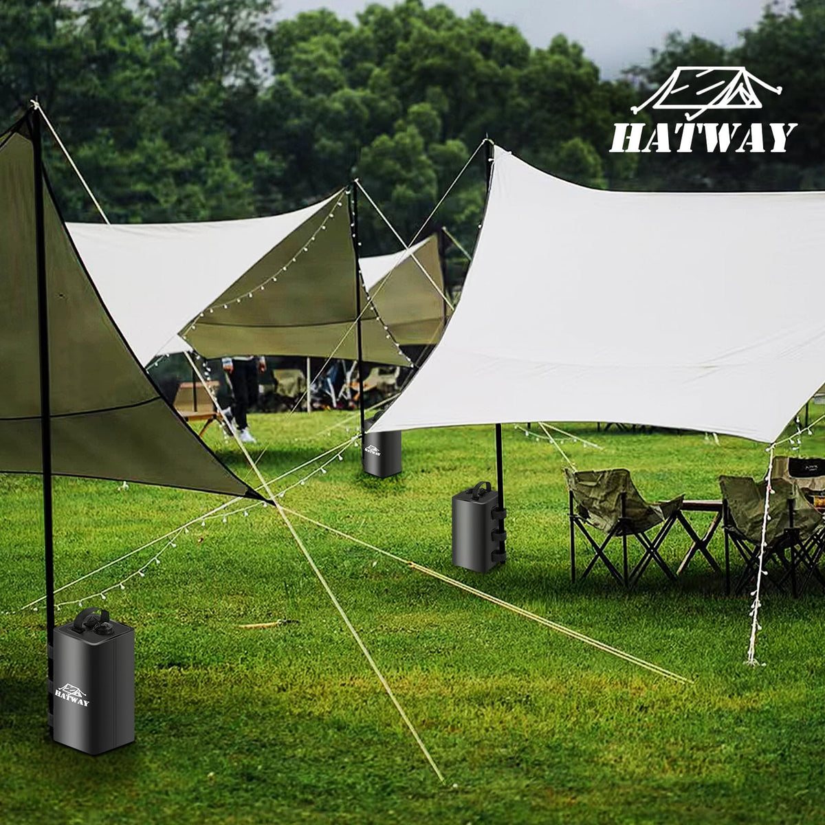 Hatway gazebo weights securing a canopy on windy beach ground.