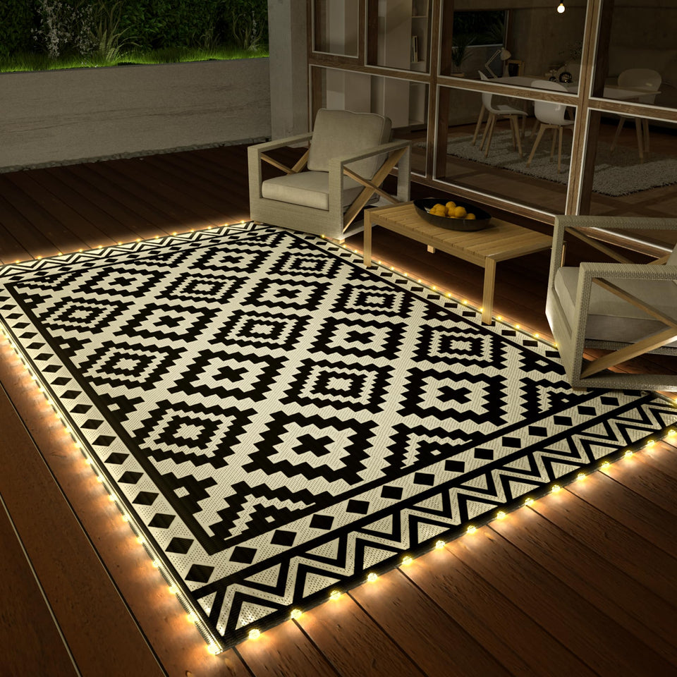 HAUSHOF 5x8 outdoor rug with LED strip light for ambient evenings outdoors