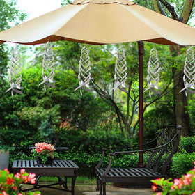 Hausse 15.8-inch tall spinner stands out in gardens and trees.