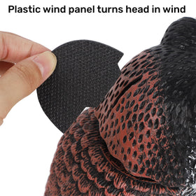 Hausse outdoor-ready owl decoy in windy conditions.