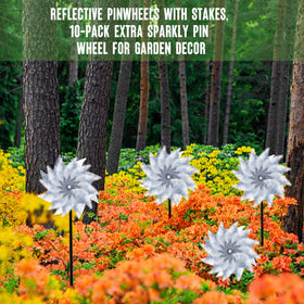 Hausse pinwheels on trees and fences add decorative value and deterrence.