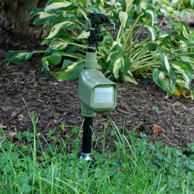 HAVAHART Critter Ridder sprinkler-action sprays water to startle intruders.