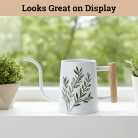 HB Design Co ergonomic wood handle provides a comfortable watering motion.