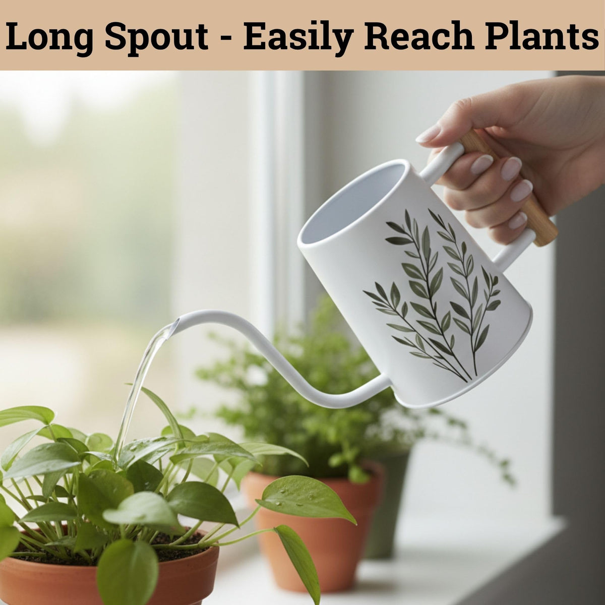 HB Design Co white watering can with leaf pattern enhances any windowsill.