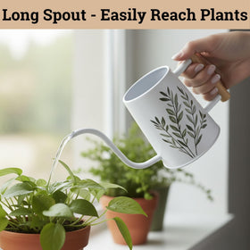 HB Design Co white watering can with leaf pattern enhances any windowsill.