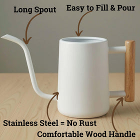 HB Design Co wood-handle watering can close-up highlighting comfortable grip for easy watering.