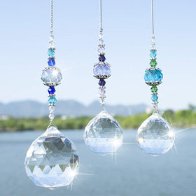 H&D Hyaline & Dora clear crystal prism ball close-up with sparkling light refractions