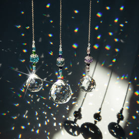 H&D Hyaline & Dora 30mm prism ball catching sunlight to create colorful rainbows