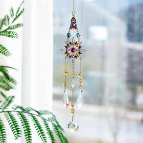 H&D HYALINE & DORA glass icicle prism ornament adds sparkle to windows.