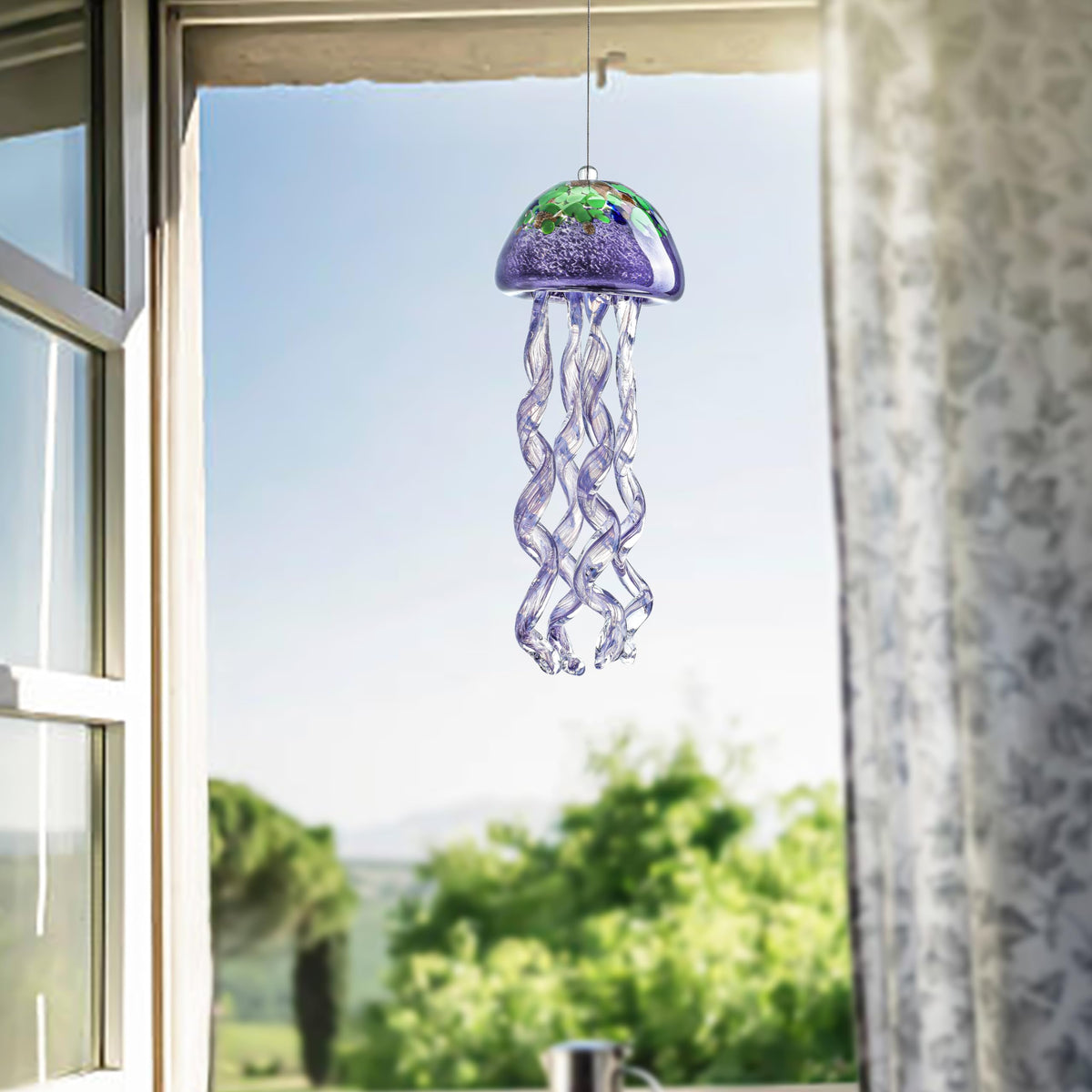 H&D HYALINE & DORA Vibrant purple glass creates eye-catching focal points