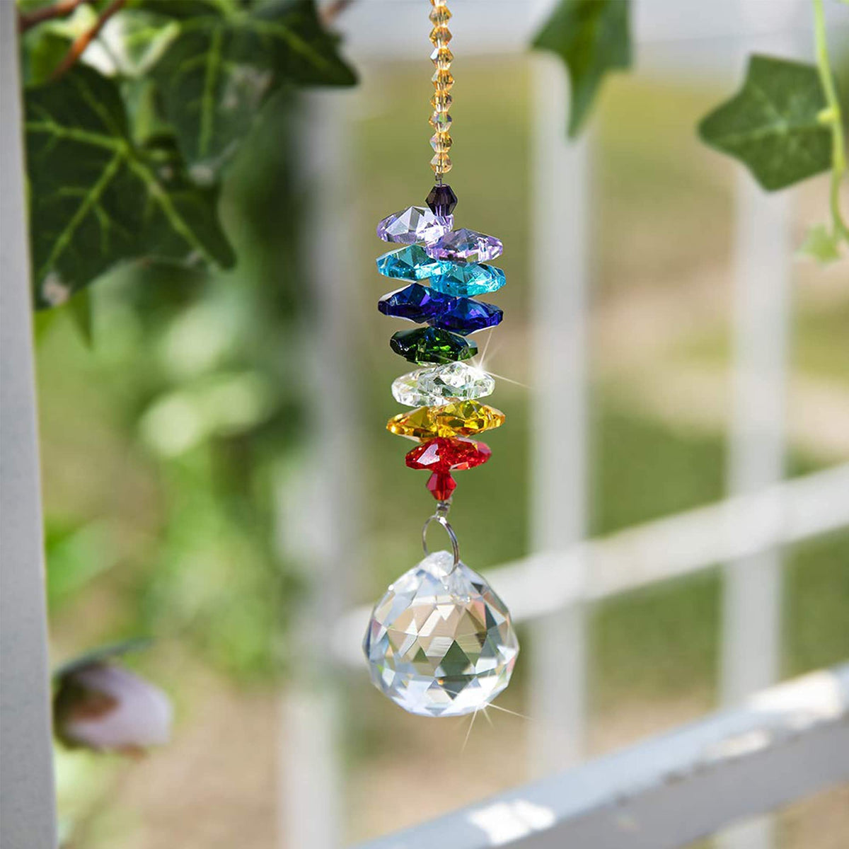 HD Hyaline & Dora 30mm chandelier crystal ball catches sunlight, creating vivid rainbow specks.