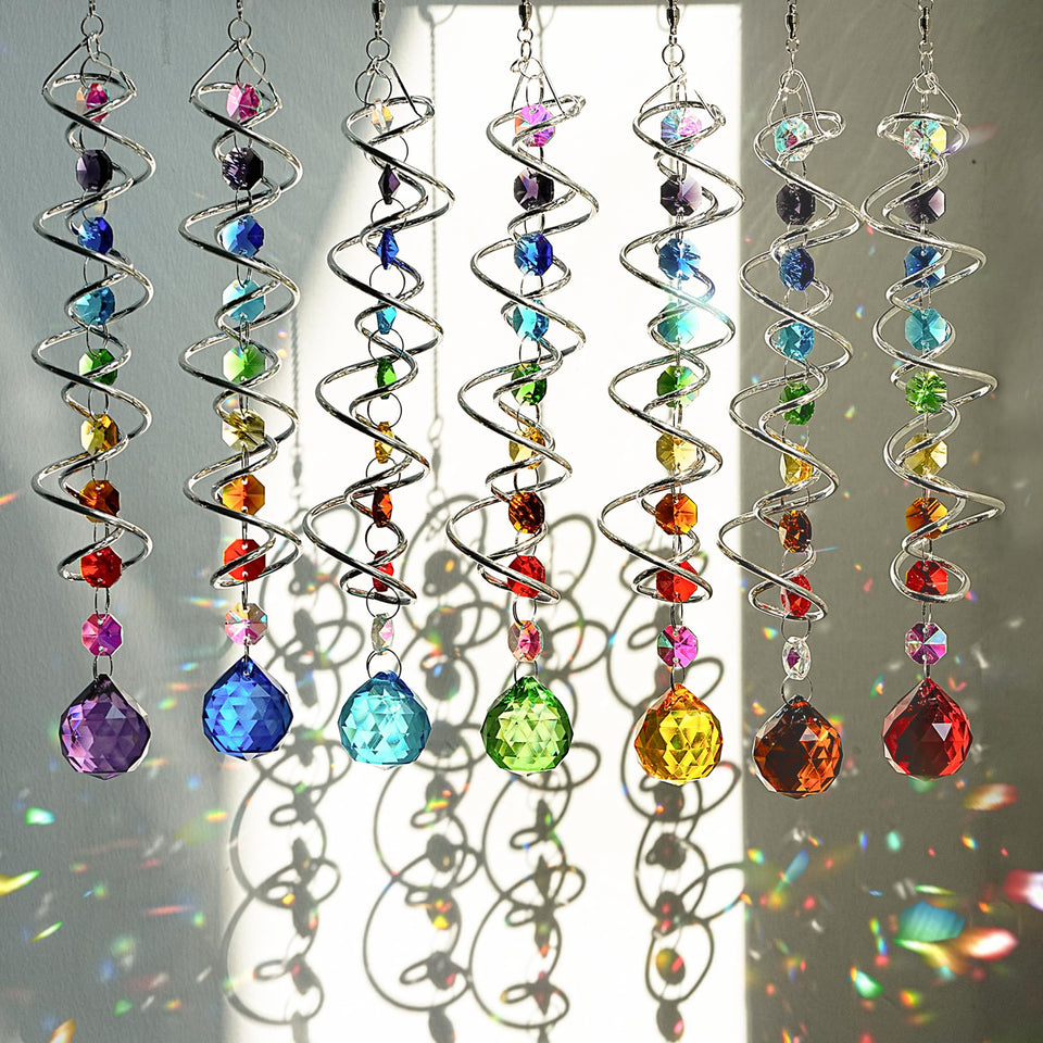 H&D HYALINE & DORA 7-pack crystal suncatchers on a window casting colorful reflections