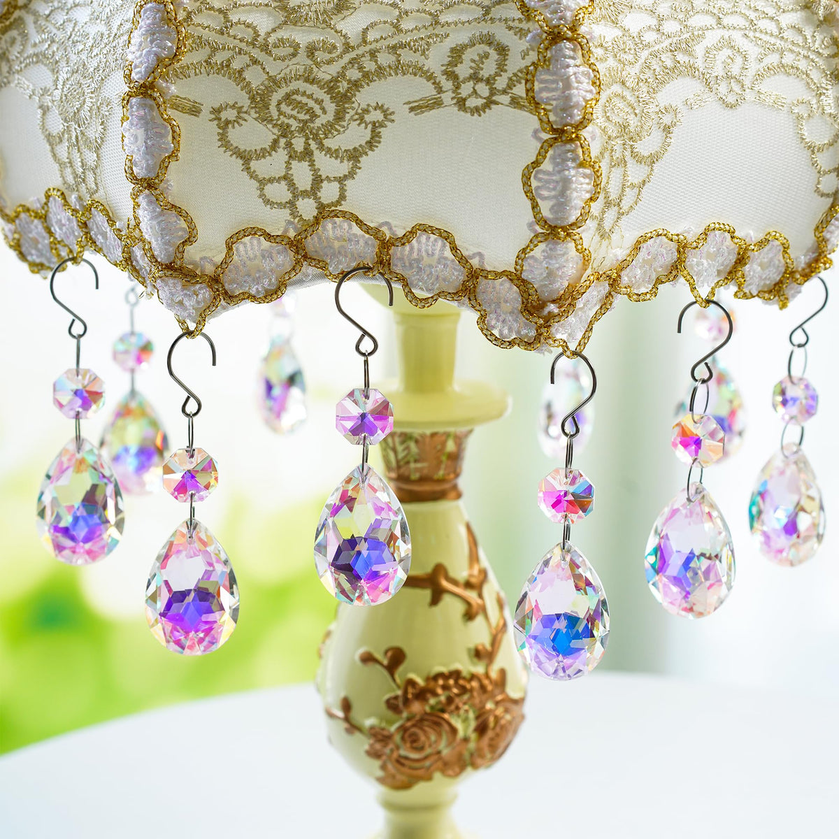 H&D HYALINE AND DORA bauhinia crystal suncatcher bead creates rainbow hues in bright rooms.