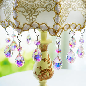 H&D HYALINE AND DORA bauhinia crystal suncatcher bead creates rainbow hues in bright rooms.