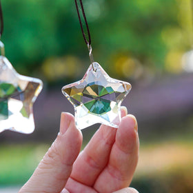 H&D HYALINE & DORA garden crystal ornament with rainbow effects.