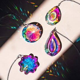 HDCRYSTALGIFTS 63pipa prism catches sunbeams to cast vibrant color across the room.