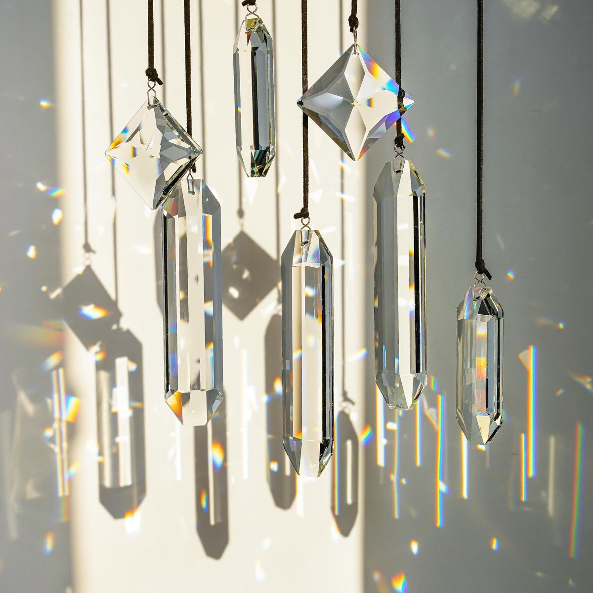 HDCRYSTALGIFTS crystal prisms suncatcher decorating the kitchen with gentle sparkle.