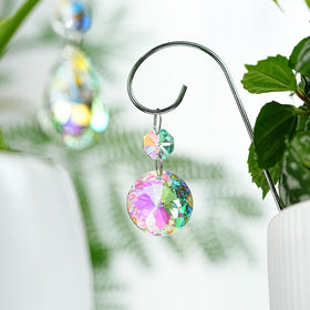 HDCRYSTALGIFTS rainbow prism window decor brightens windowsills with sparkling color.