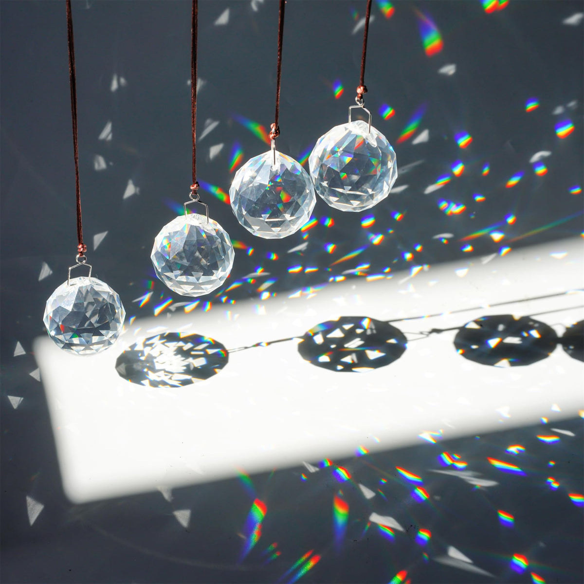 HDCRYSTALGIFTS rainbow-suncatcher-prism adds vibrant color when hung in a sunny window