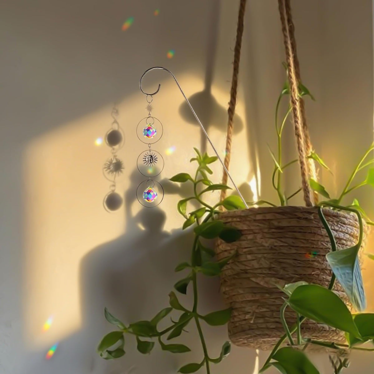 HDCRYSTALGIFTS sun catcher in garden window creates vibrant reflections and a tranquil atmosphere