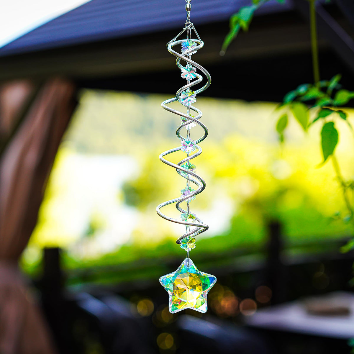 H&D Hyaline & Dora sparkly wind spinner adds warmth and charm to seasonal decor