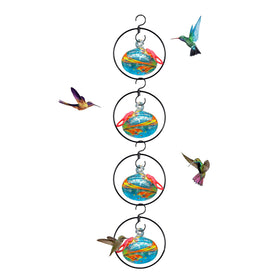 Headak Life hand-blown blue glass hummingbird feeder with four ports for outdoor nectar.