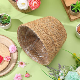 Healifty seagrass planter basket, portable and versatile for plants.