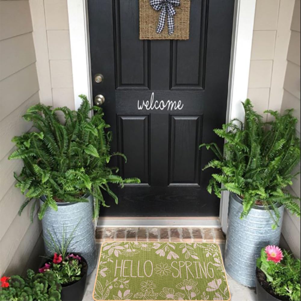 Heirloom Haven Hello Spring mat showcasing waterproof surface for outdoor durability