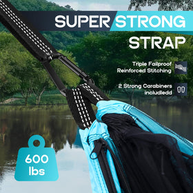 HGYI two-person bug-net hammock used as tent-like lounger in nature.