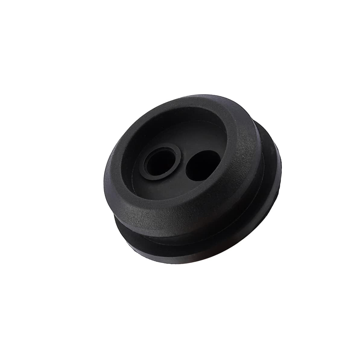 Trimmer fuel system grommet fitment demonstrates stable routing and seal.