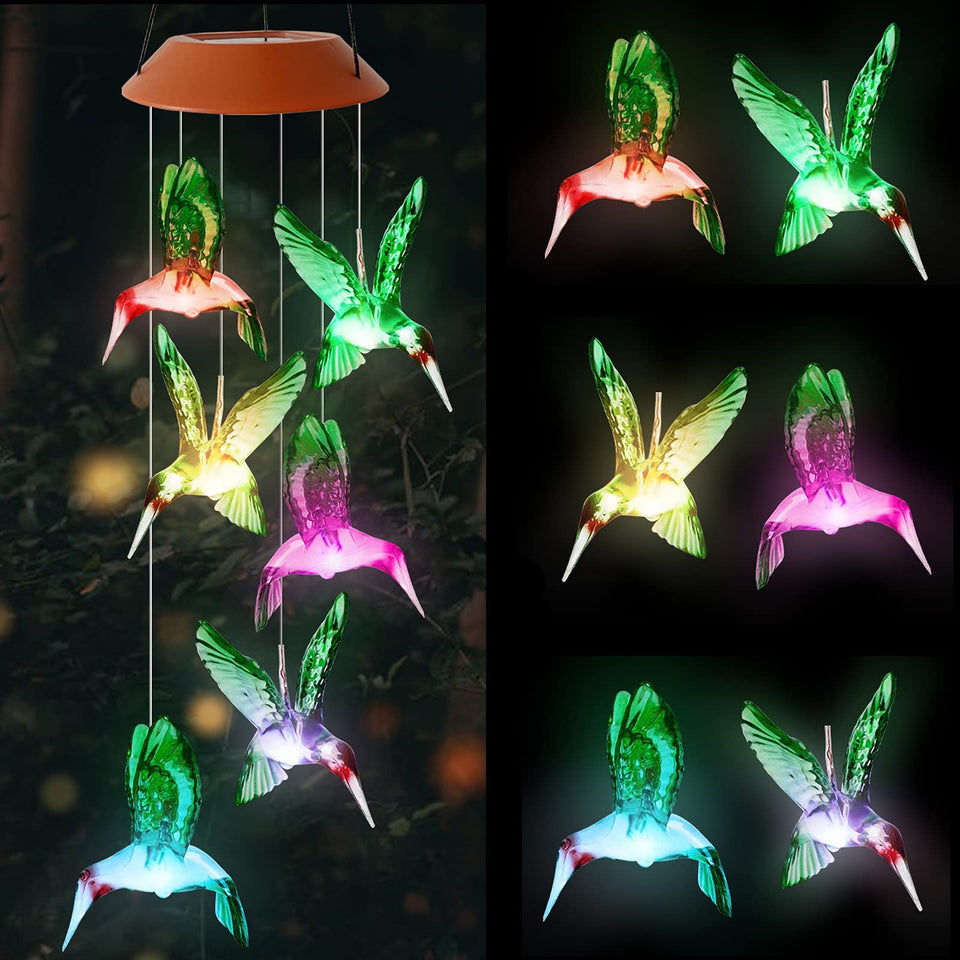 HiSolar hummingbird solar wind chimes color-changing lights brighten outdoor spaces at dusk.