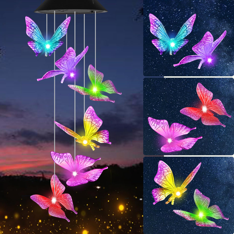 HiSolar purple butterfly solar wind chime lighting the garden at dusk