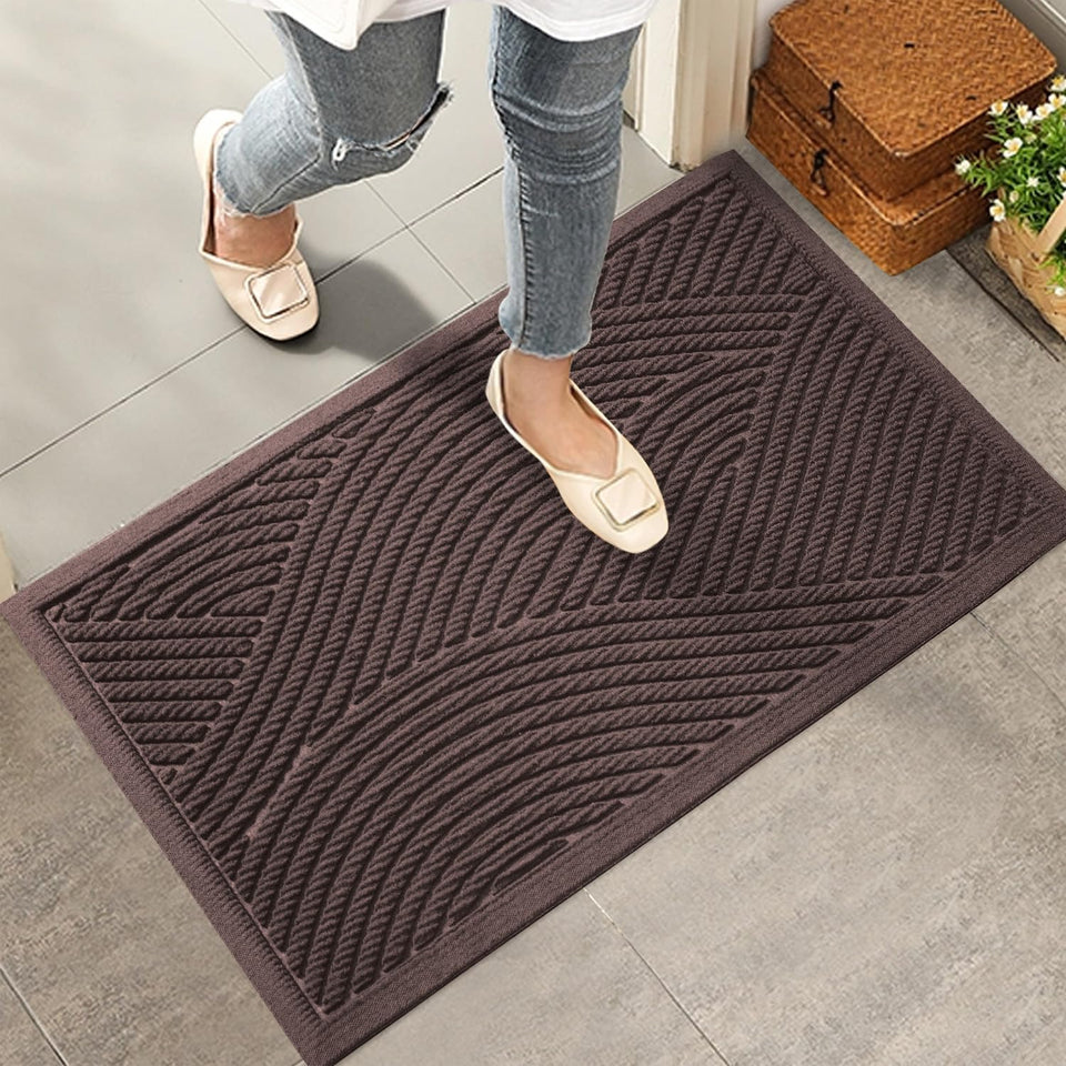 HIYARD sturdy front door mat with absorbent surface for dirt capture and moisture control.