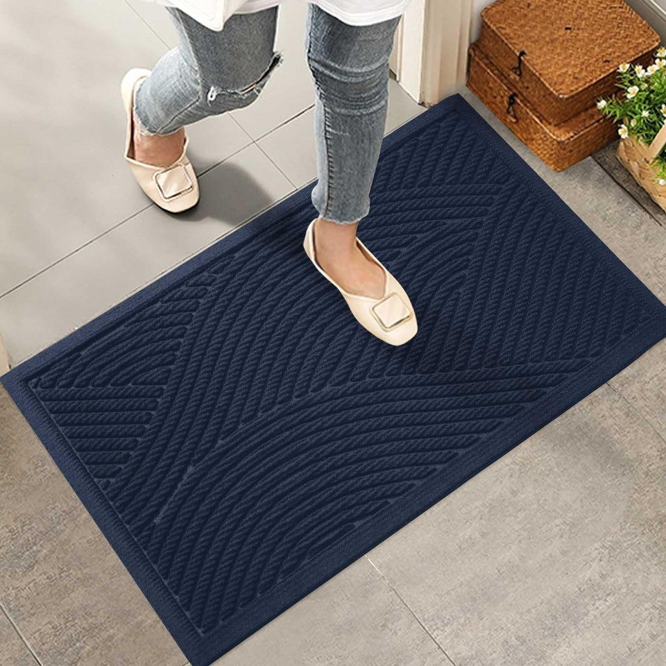 HIYARD sturdy front door mat with absorbent surface traps mud and moisture.
