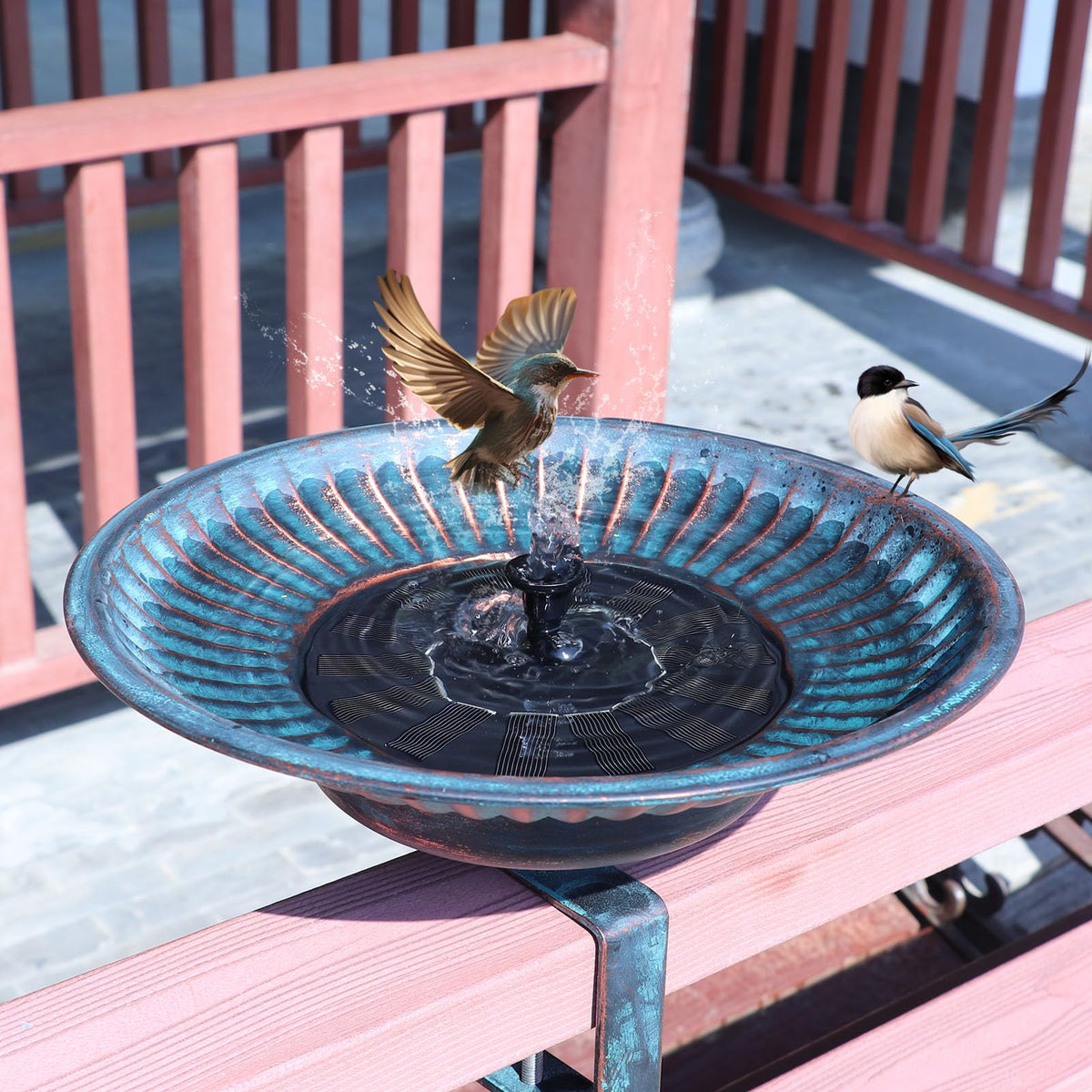 HLQMFHT solar bird bath fountain on deck attracts birds with a gentle splash in direct sun.