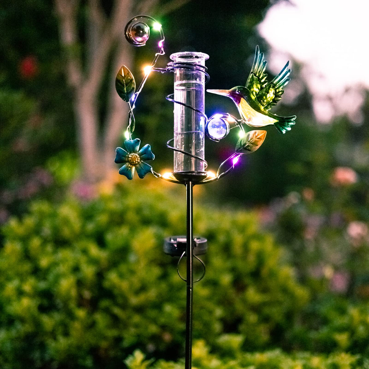 HOBYLUBY hummingbird rain gauge LED lights illuminate pathways after dusk.
