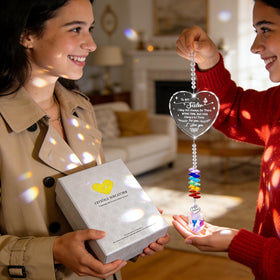 Hoemwarm clear crystal pendant refracts light into a cheerful display.