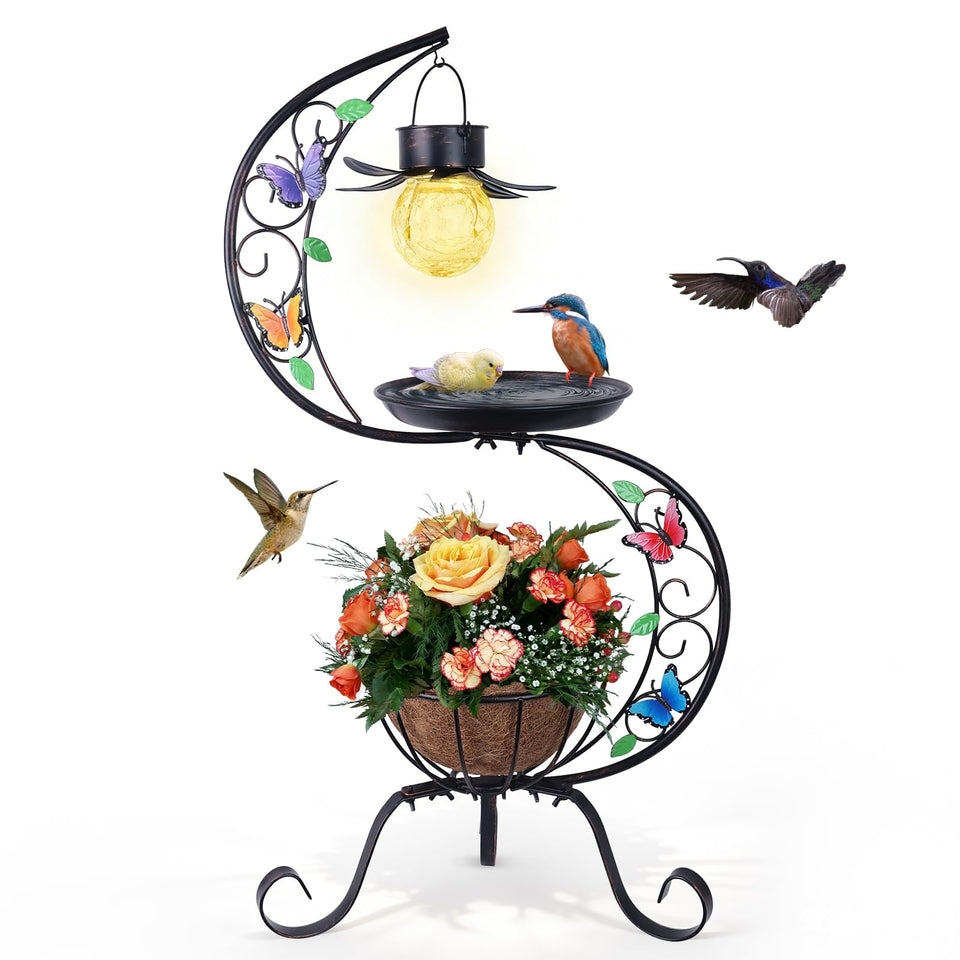 hogardeck birdbath with solar lamp glowing at dusk to attract birds
