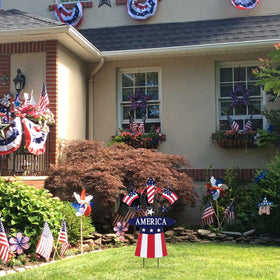 hogardeck memorial day garden stake complements flower beds and entryways.