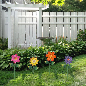 Hogardeck orange flower stake creates cheerful patio accents.
