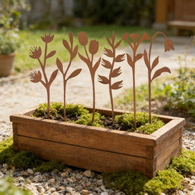 Hogardeck metal garden stake with rust finish endures all weather conditions.