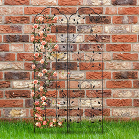 Ornate leaf design Hogardeck trellis blends with garden scenery.