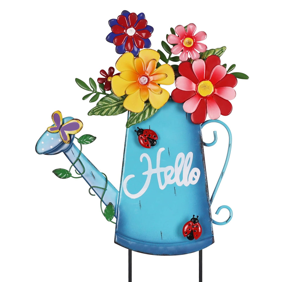 hogardeck watering can stake with vibrant flowers greets guests at the garden path