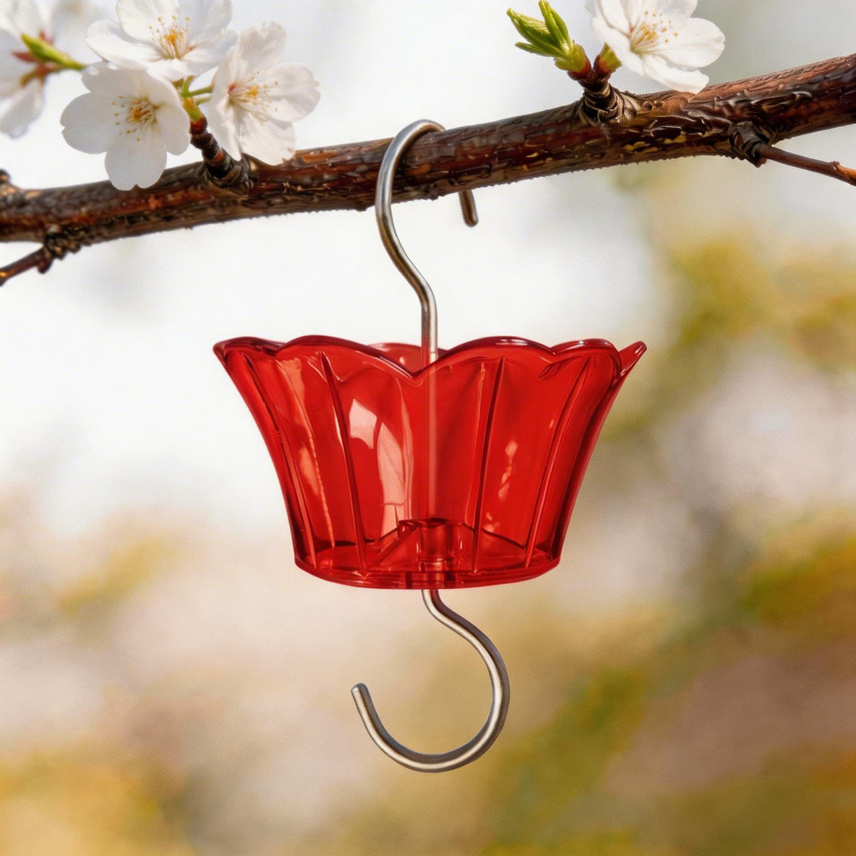 HOLAHOMA Ant Moat in red sakura design attracts hummingbirds to nectar.