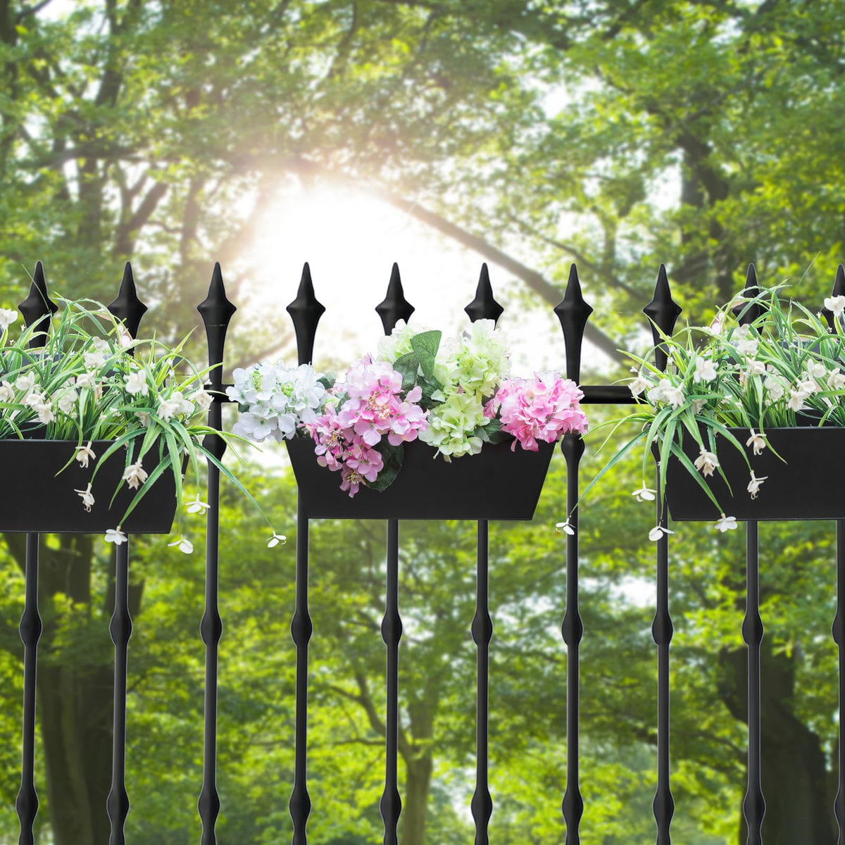 Planters filled with colorful flowers on a balcony rail by Holensun