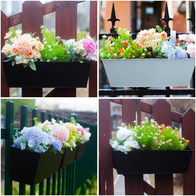 Holensun 16-inch black planter with vibrant flowers and greenery