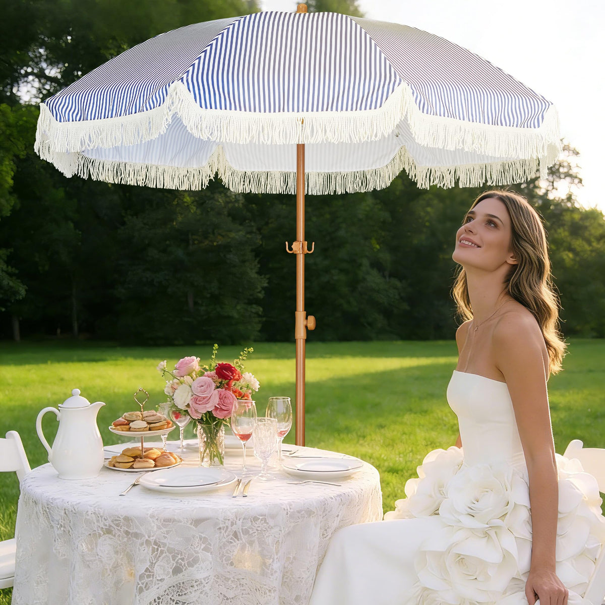 HOMEDEMO backyard patio setup featuring a chic fringe umbrella.