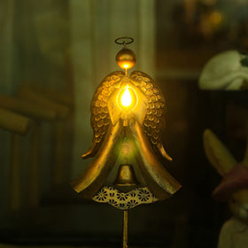 Solar panel powers the angel stake for auto on/off illumination.