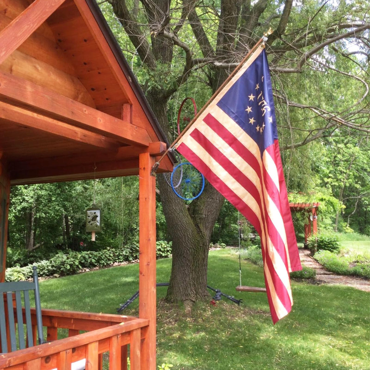 Homissor Betsy Ross flag outdoor display on porch or garden.