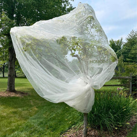 Homoda 15x15ft fruit tree netting covers a large tree to protect fruit from pests